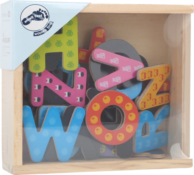 the shrinkwrapped wooden box containing colorful wooden letter magnets