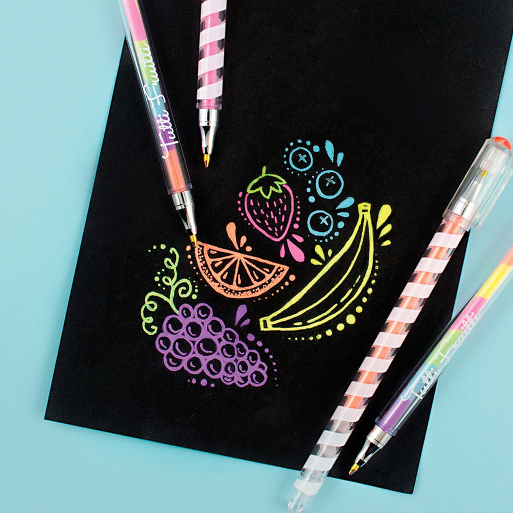 a black piece of paper with brightly colored drawn fruits with four pens