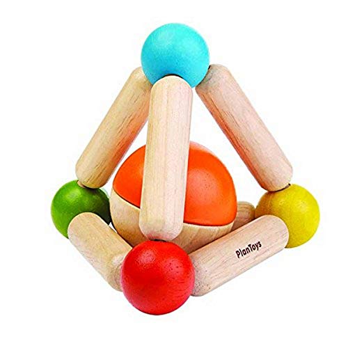 photo of wooden multicolored triangle clutching toy