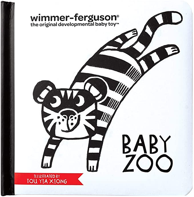 photo of baby zoo children's book with black and white cartoon tiger on front