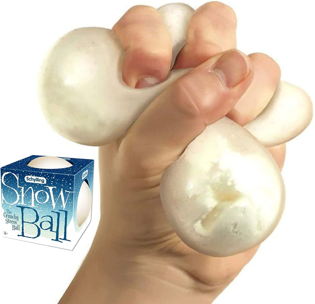 a hand squeezing the snow ball