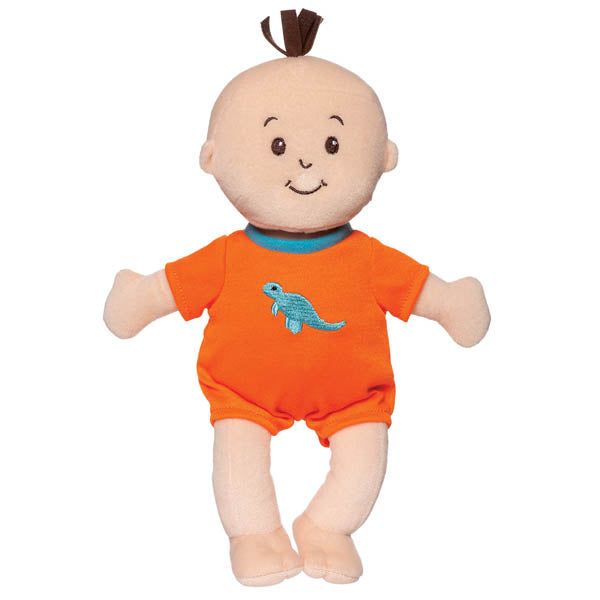 photo of plush baby doll in orange onesie