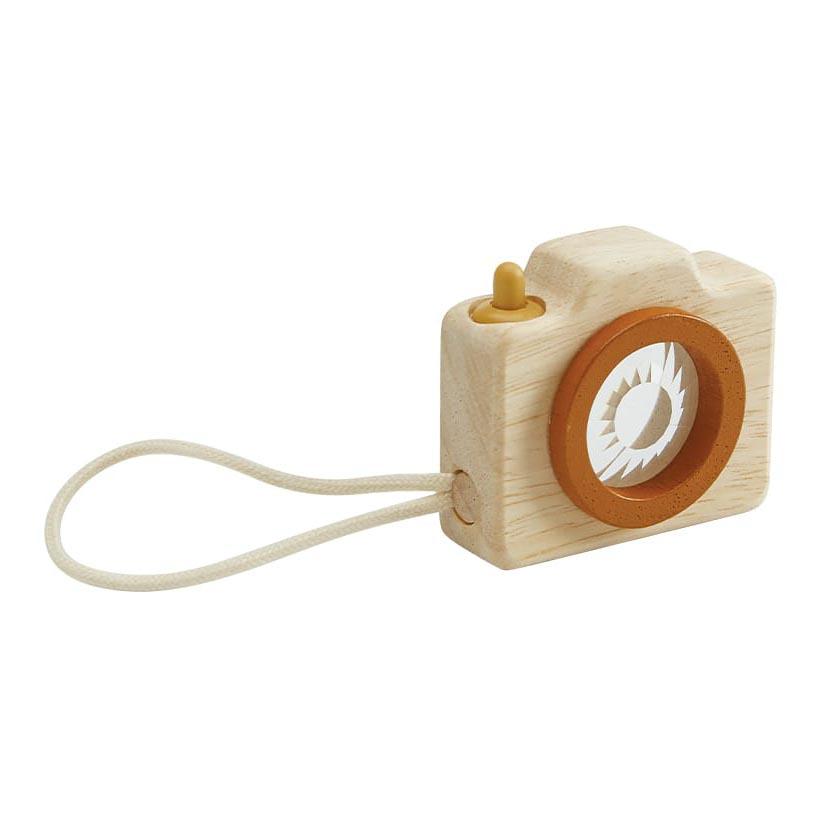 photo of wooden camera with lense