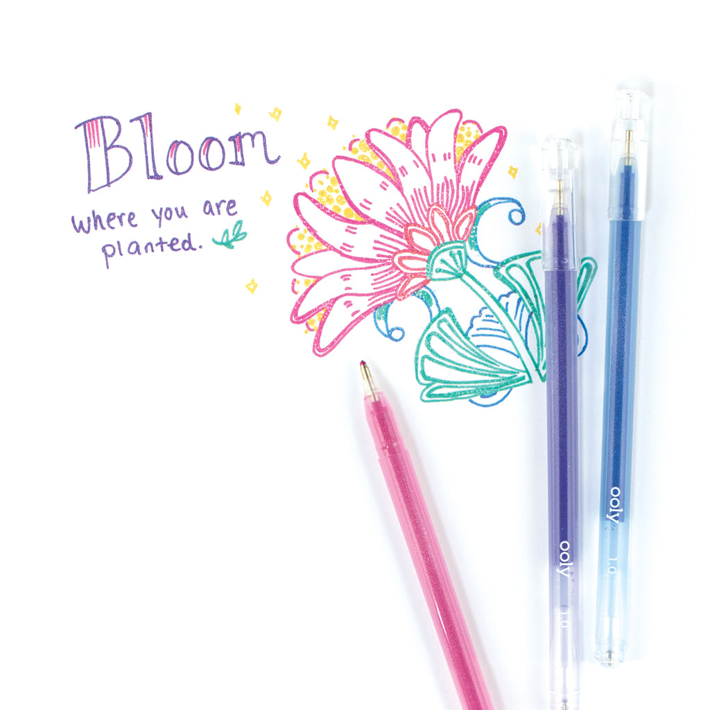 a sketch of flowers and lettering with three pens