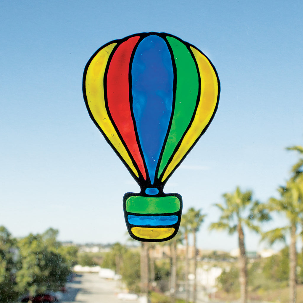 the fully colored hot air balloon clinging to a window