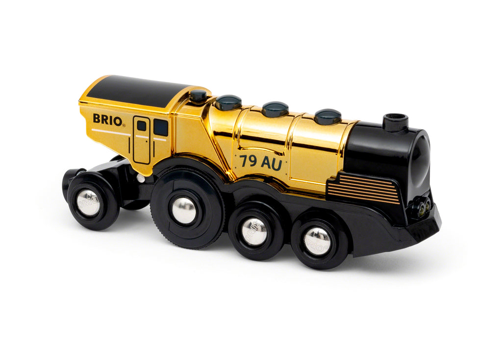 the shiny gold and black locomotive engine
