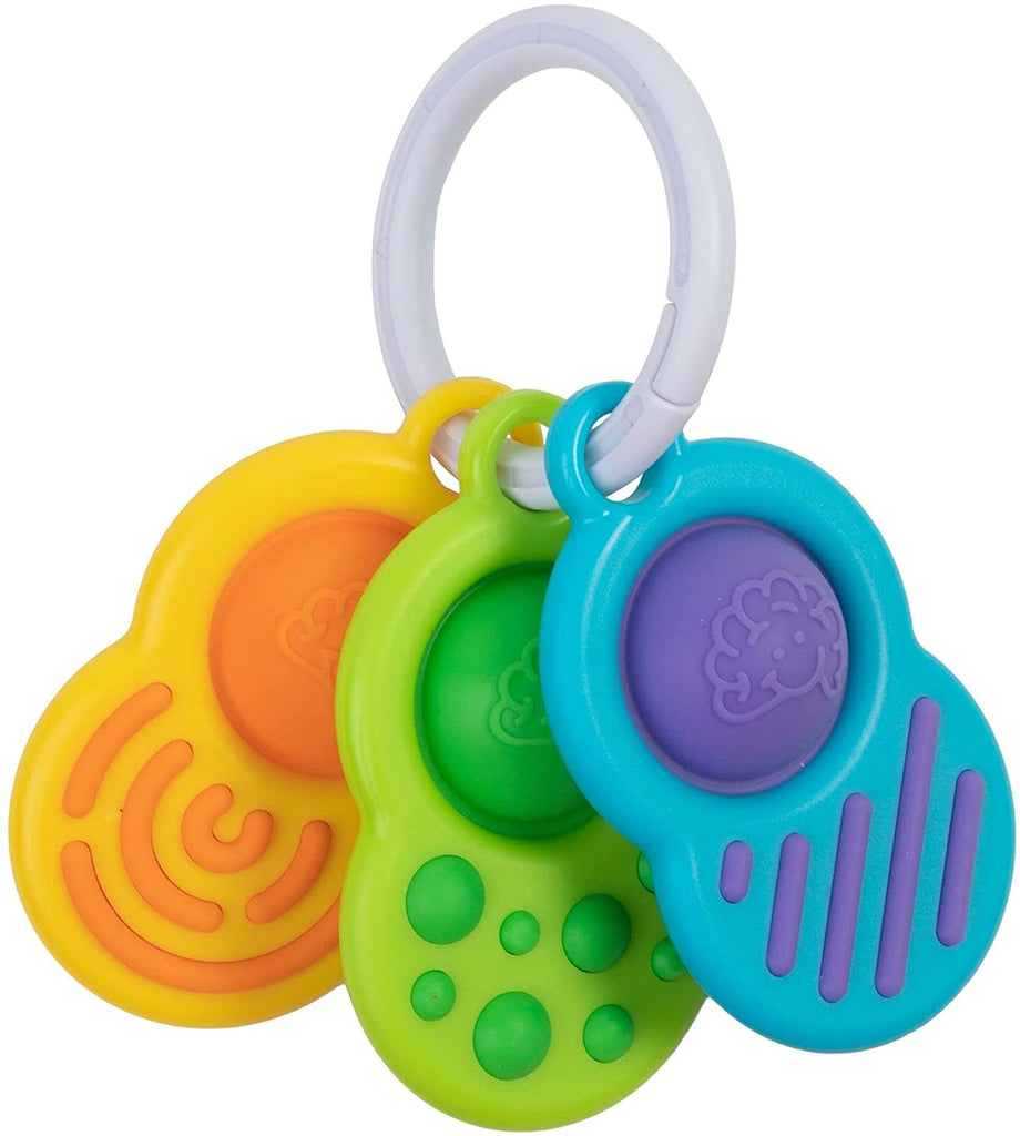 the dimple clutch consisting on three textured teethers on a ring