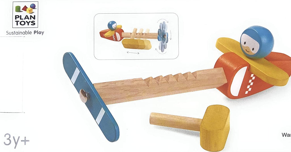photo of red and yellow wooden toy airplane with closeup of spinning propeller