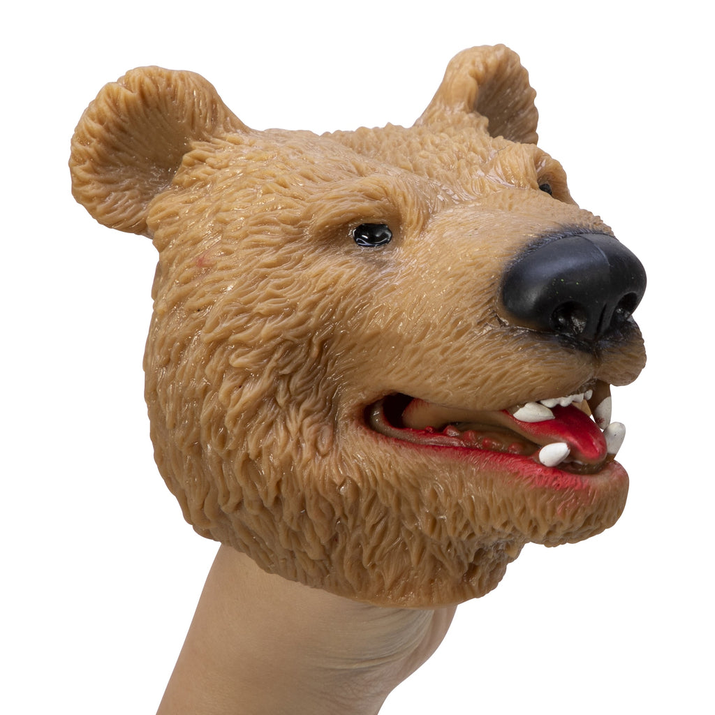 a hand with the grizzly bear puppet on it