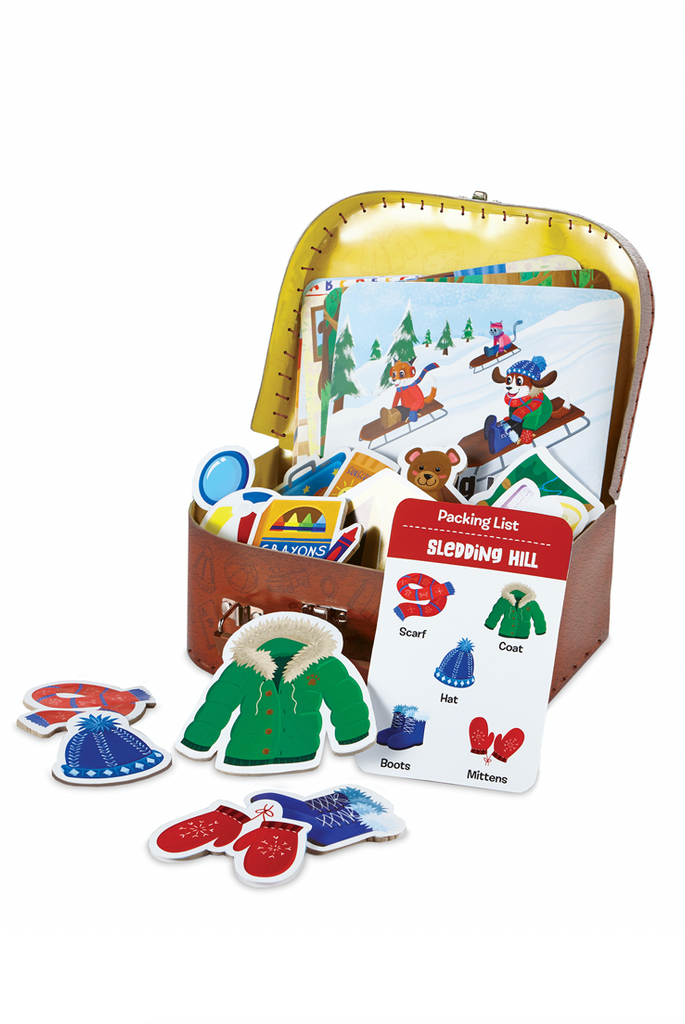 the suitcase game open with all the cards and playing pieces