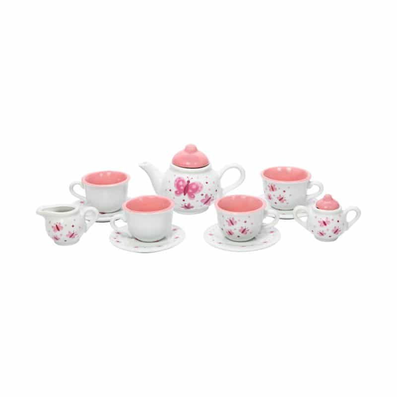the tea set with cups, saucers, sugar bowl, pitcher, and creamer