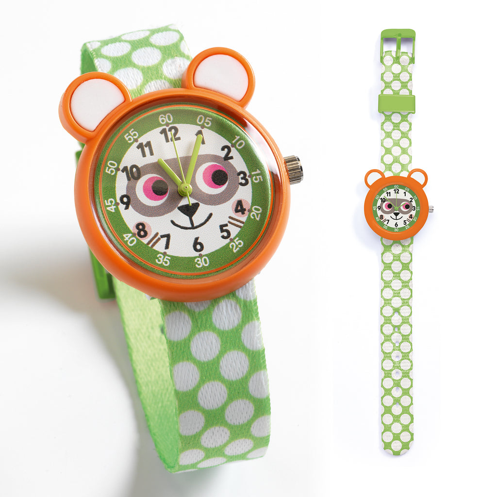 a green watch with a raccoon face on the watch