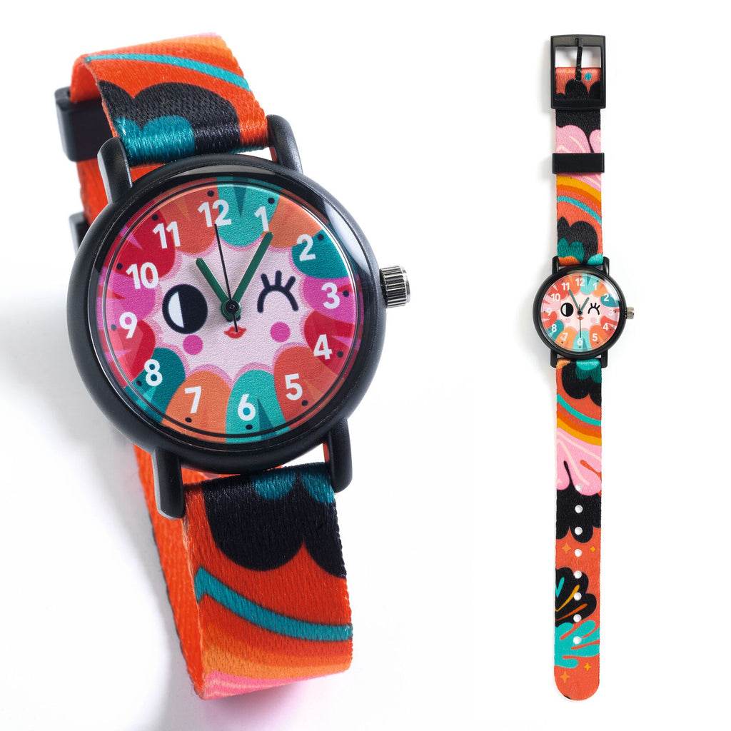 a colorful watch with a winking face on the watch face