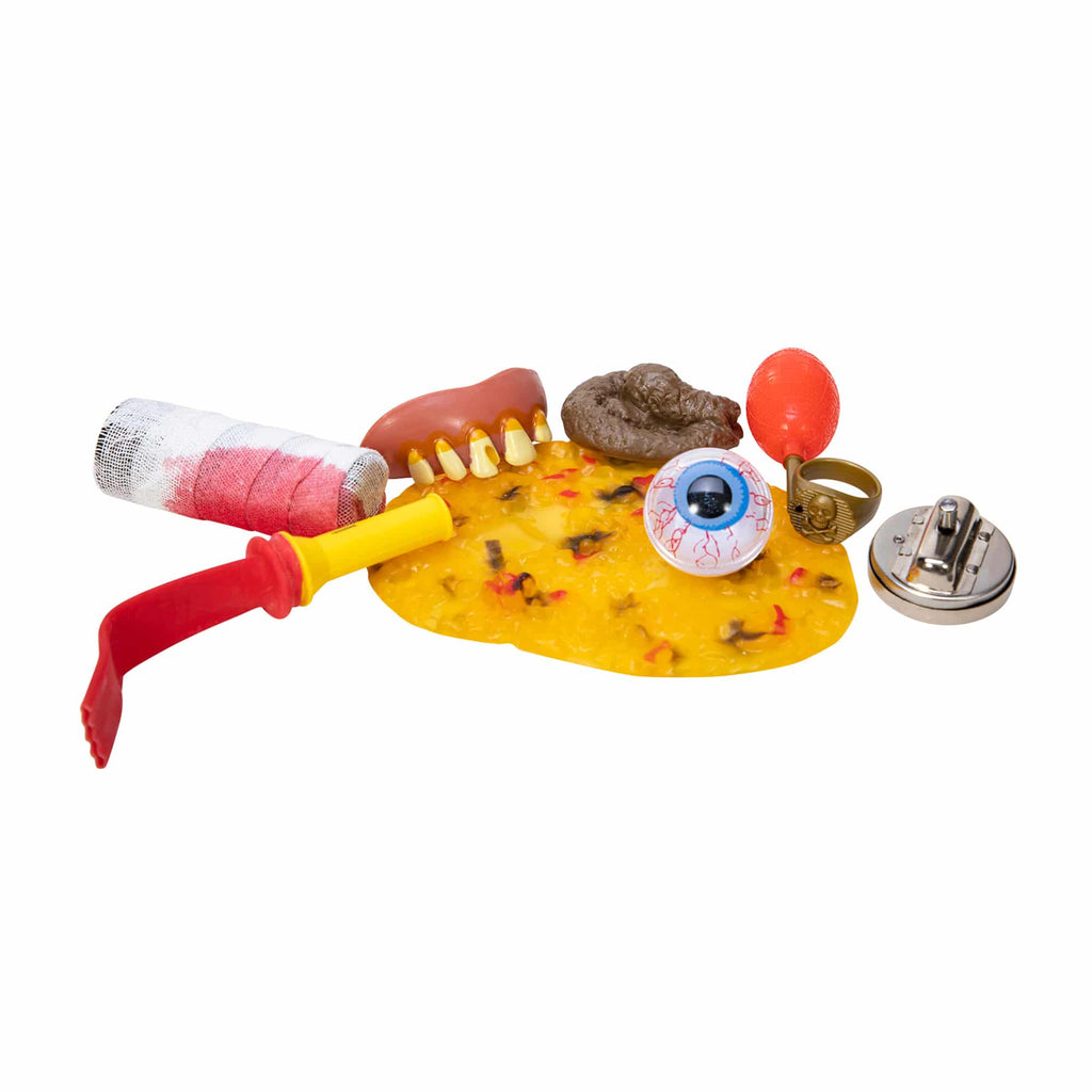 The joke’s on you with this Jumbo Joke Box. Box comes with 8 classic gags in one package! Includes goofy teeth, hand buzzer, floating eyeball, vomit, a bandaged finger, ring the squirts water, doggy stool, and fart whistle.