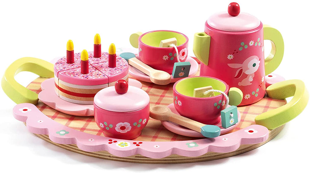a toy tea set featuring cups, a platter, cake, spoons, saucers, and a tea pot