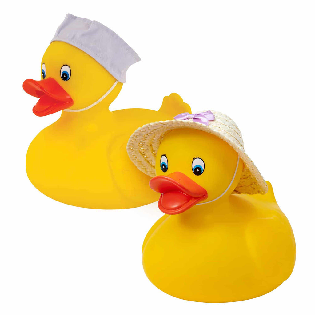 Two large rubber ducks- one with a sailor hat and one with a straw hat