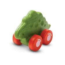 green wooden stegosaurus with orange wheels