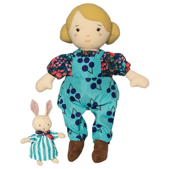 photo of plush girl in blue overalls with plus bunny companion in blue striped dress