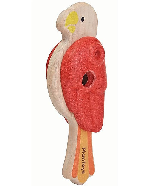 wooden parrot with red wings