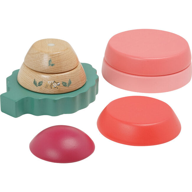 photo showing multicolored pastel toadstool stacking toy unstacked